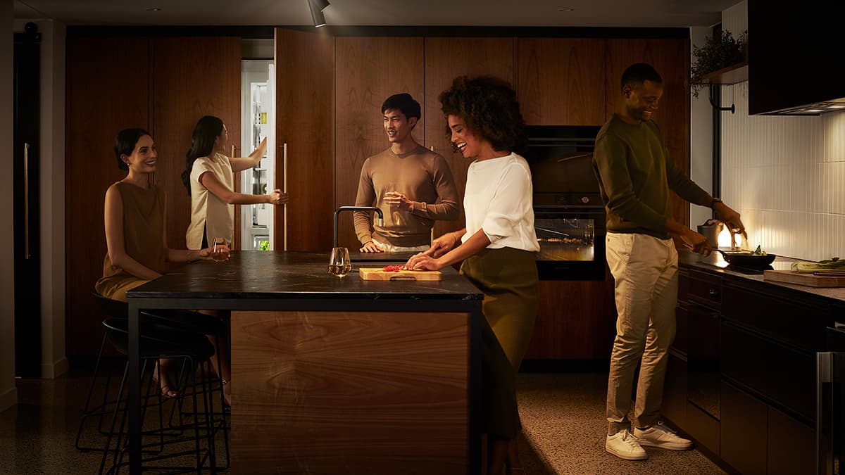 Shot of entertainment in the kitchen, showcasing integrated appliances